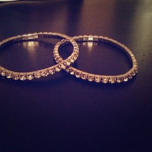 Two silver stretchy bracelets