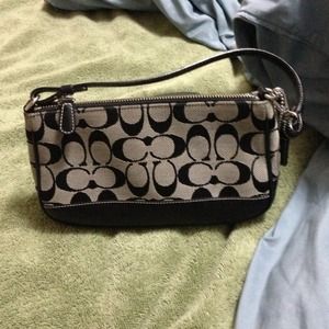 This is authentic coach clutch I got.