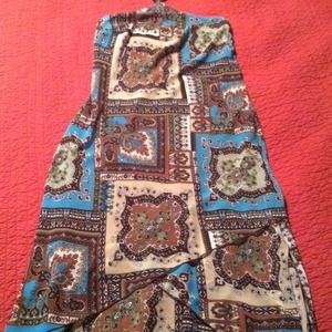 Knee length dress with beaded neckline