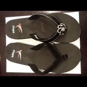 Flip flops with interchangeable straps.