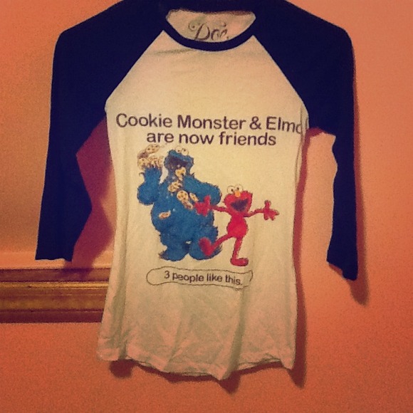Elmo and Cookie Monster baseball shirt. Worn once!
