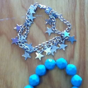 Silver star and teal bracelets
