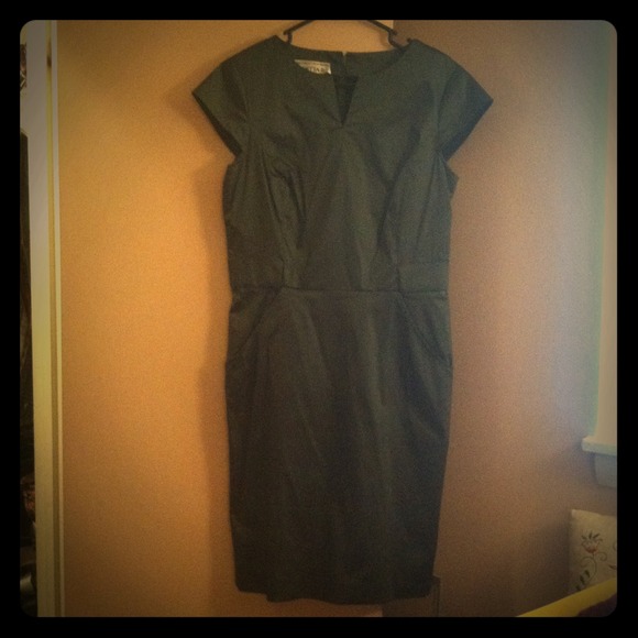 Vintage inspired emerald green satin pencil dress.