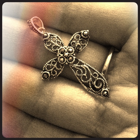 Beautiful ornate silver plated cross pendant!