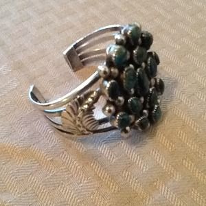 Sterling silver and genuine turquoise bracelet.