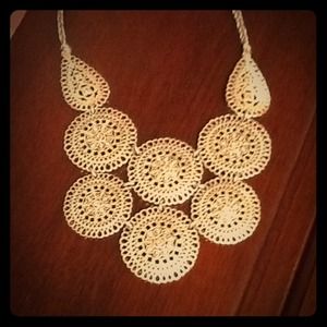 Silver bib necklace.