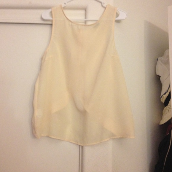 Yellow sheer tank with semi open back with buttons