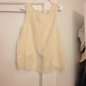 Yellow sheer tank with semi open back with buttons