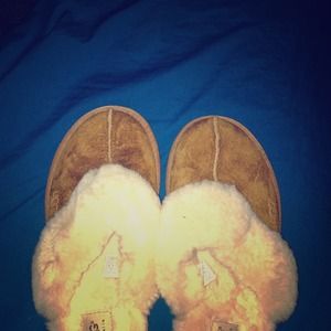 lightly worn, size 8 pair of UGG cozy slip ons