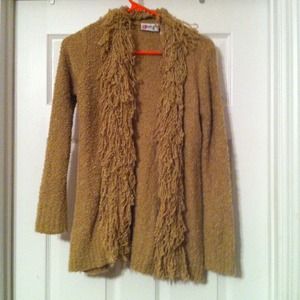 Soft light brown sweater jacket.