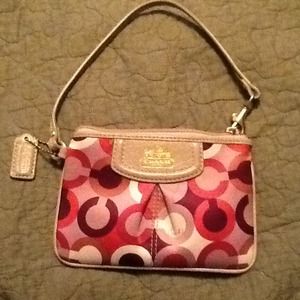 Coach Wristlet & 2 CDs