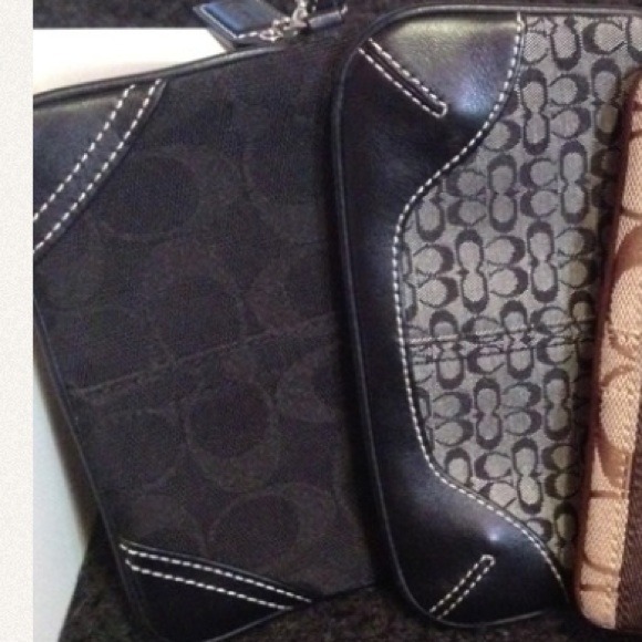 COACH signature wristlets.