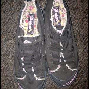 Brown sketchers shoes