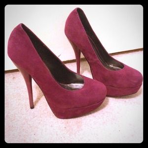 Violet platform heels.