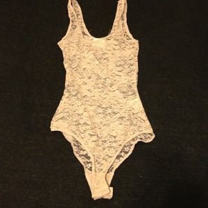 Lacey cream body suit.