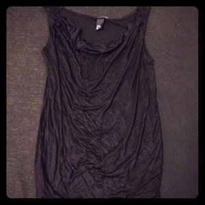 Black sleeveless shirt.