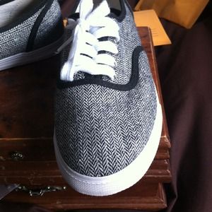 Gray and black shoes with little sparkles
