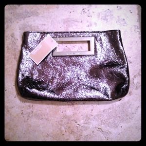 Reserved! Brand new michael kors clutch with tags!