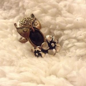 Owl ring and flower ring.