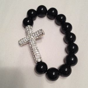 Sold   Black stretch bracelet with crystal cross