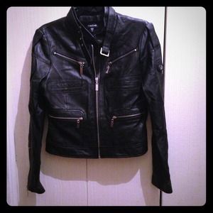 Black leather biker jacket with silver detailing.