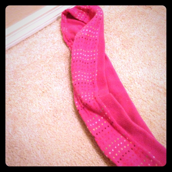 Long pink scarf.