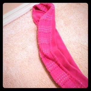 Long pink scarf.