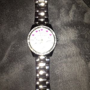 Silver stainless steel Betsey Johnson watch.