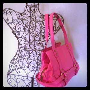 Oversized pink juicy couture leather handbag.