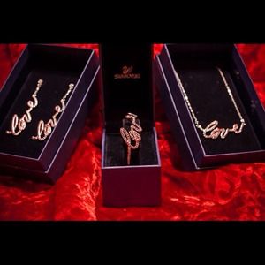 JUST REDUCED! Swarovski Love Set of 3 in Rose Hue.