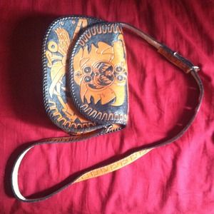 Hand carved and painted myan leather purse