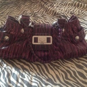 Authentic Purple and Furious Guess purse
