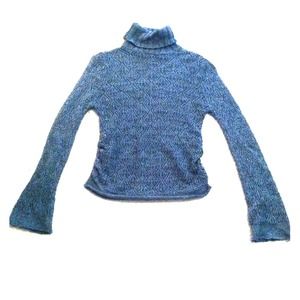 Grey knit eyelet turtleneck.