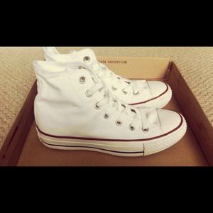 White converse high top.