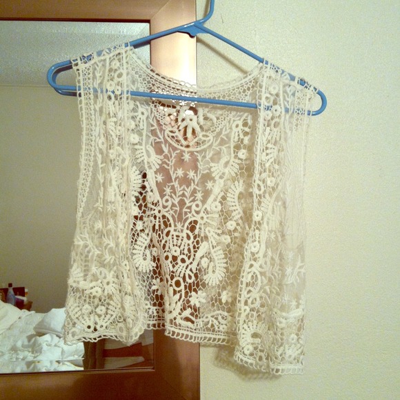 Cute lace vest.