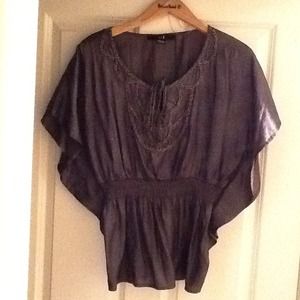 NWOT Dark Grey top w silver design.