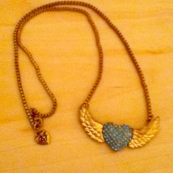 Betsey Johnson gold necklace. Heart with wings.