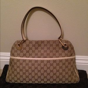 Gucci ivory/tan logo canvas handbag