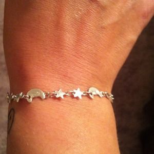 Sterling silver sun and moon bracelet.