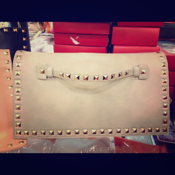 One left ivory purse !
