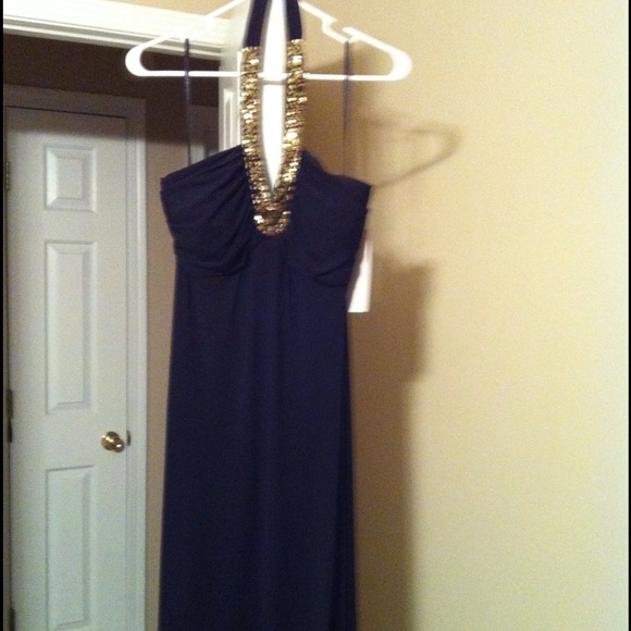 Sold Gold and black halter dress. Brand New