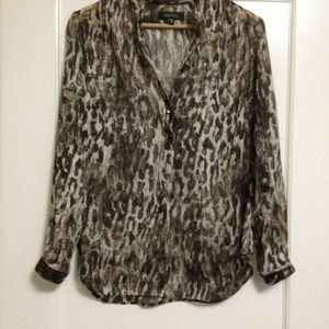 Karen Kane brown animal print sheer blouse.