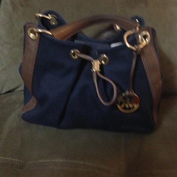 Michael Khors blue and brown bag. New with tag.