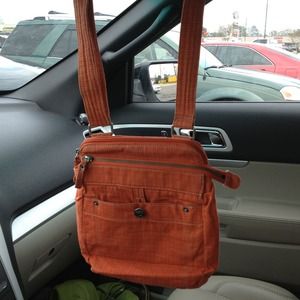 Fossil world Traveler purse crossbody orangy/peach