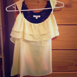 Beautiful yellow top with designed floral back