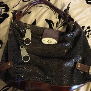 Great bag !!!! Brown with gold . Animal print