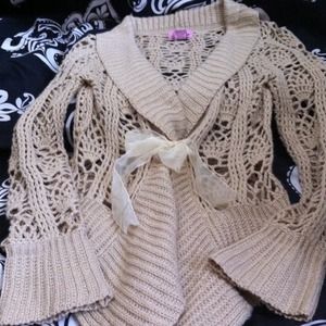 Lovely gold crocheted sweater! Perfect add layer!