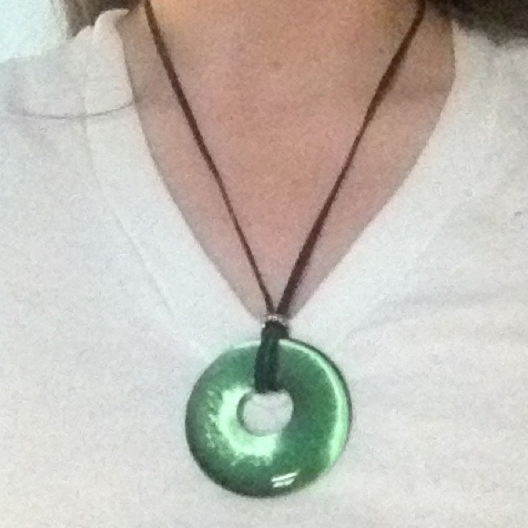 Jade green crystal on black leather string