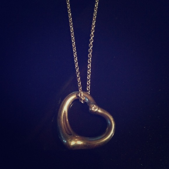 Tiffany sterling silver charm with diamond