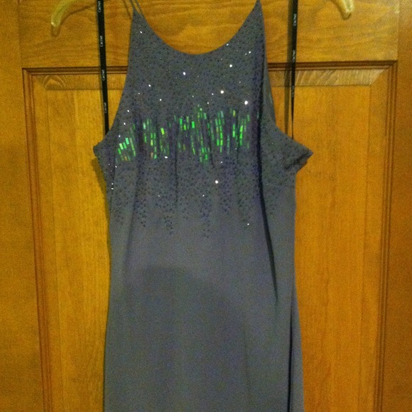 Long purple beaded evening gown